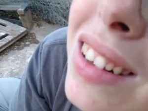 BJ with a brown dog that has a red boner